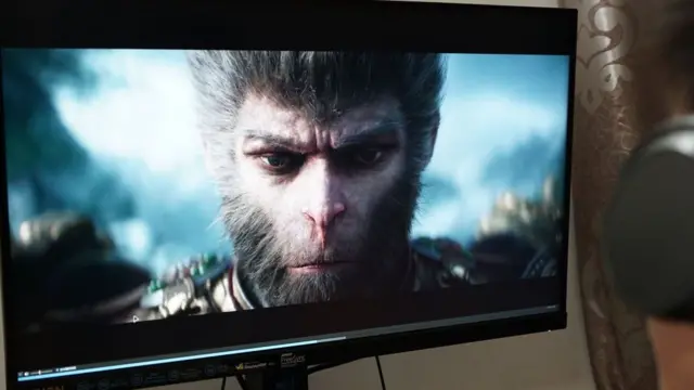 The face of an anthropomorphic monkey video game character on a computer screen